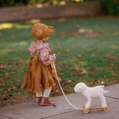 Child with pull-along toy
