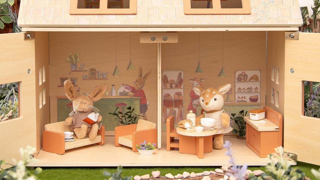 Julia the fawn and Lenny the rabbit inside the coffee house and bakery