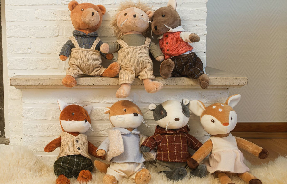 The seven Forest Friends on the fireplace ledge