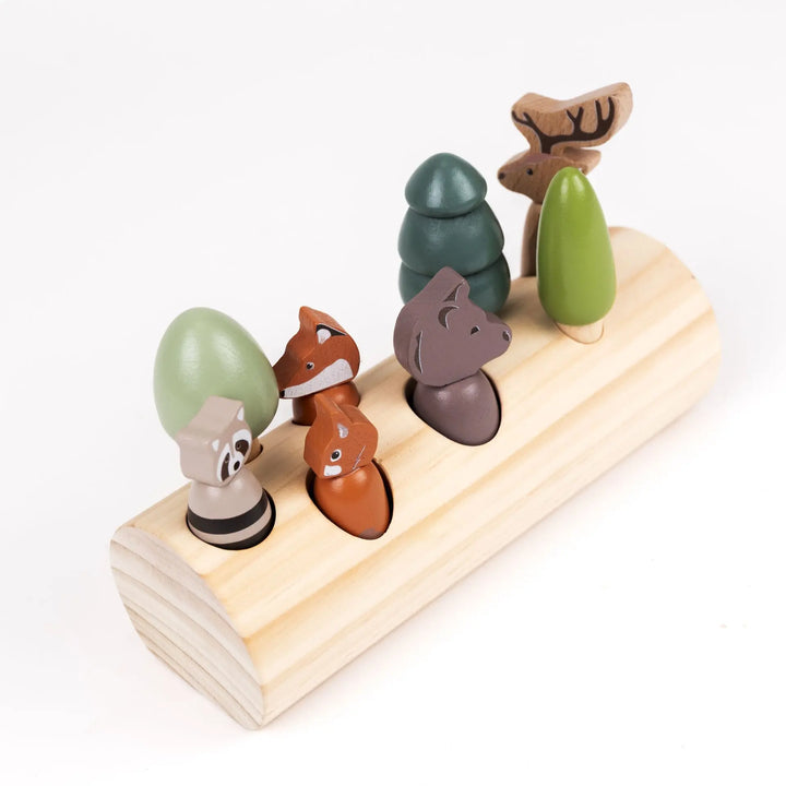 FOREST ANIMALS IN A LOG