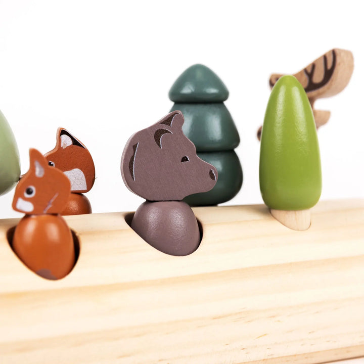 FOREST ANIMALS IN A LOG