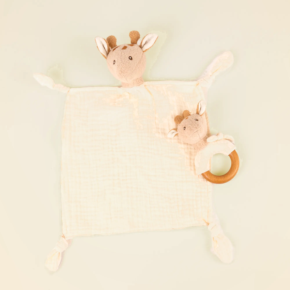 Leonie giraffe doudou and rattle on pale sand