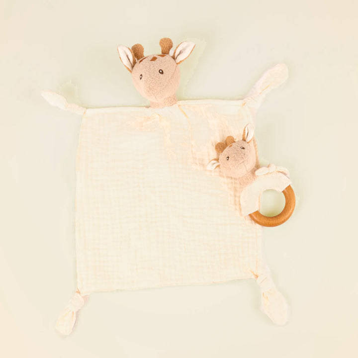 Leonie giraffe doudou and rattle on pale sand
