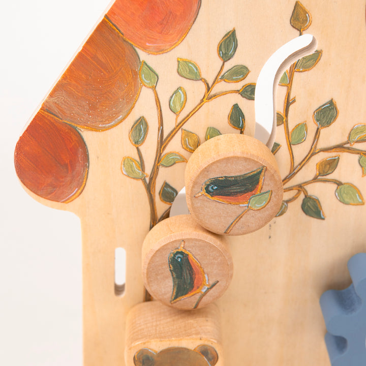 Tableau d'activités bébé en bois