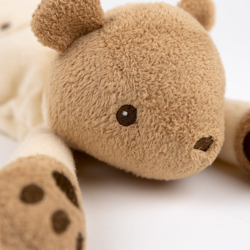 Weighted bear in pyjamas