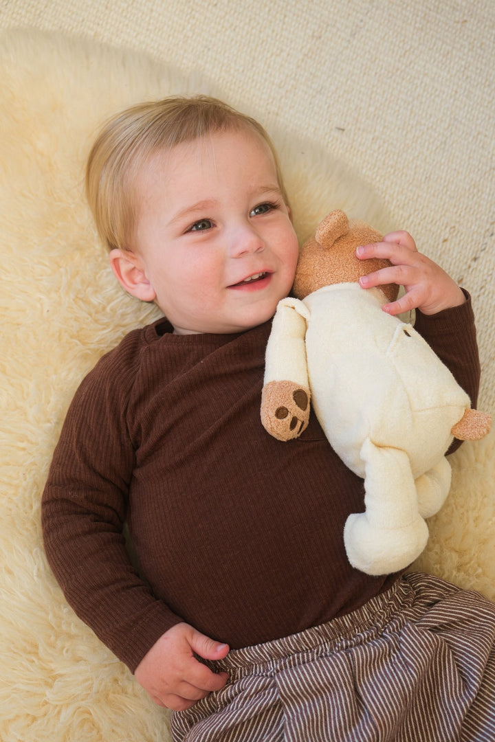Weighted bear in pyjamas