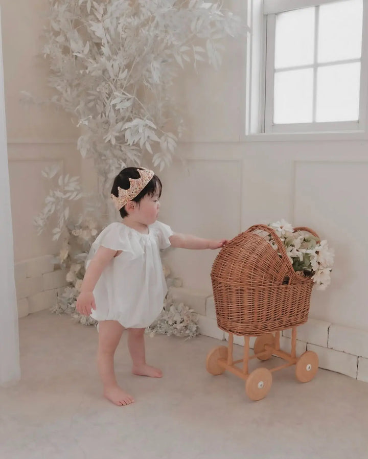 WICKER PRAM WITH KNITTED
