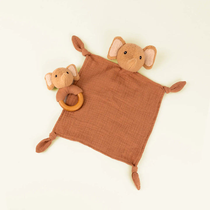 Elephant Ollie doudou and rattle on pale sand