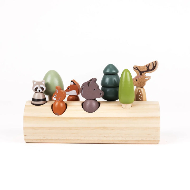 FOREST ANIMALS IN A LOG