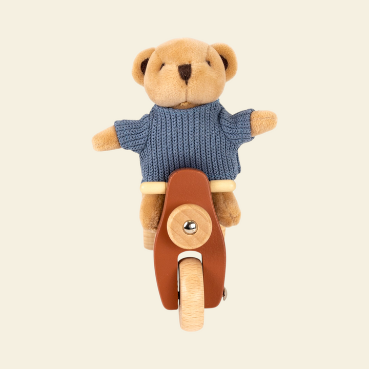 Alexis the bear on a Vespa