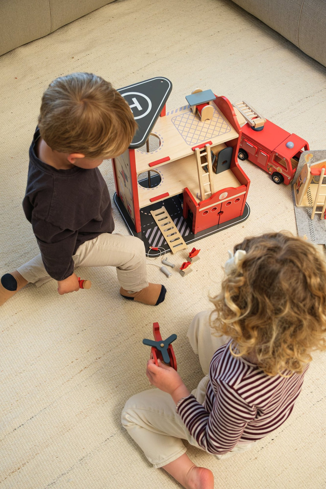 Large fire station with miniature friend