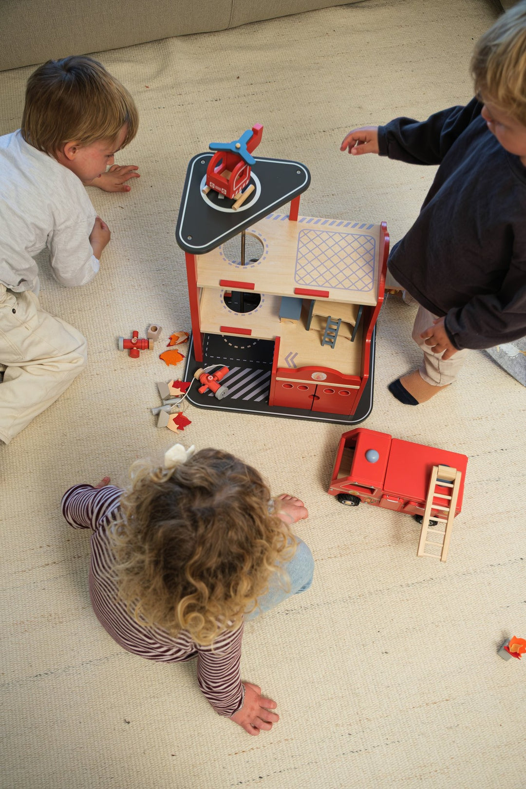 Large fire station with miniature friend