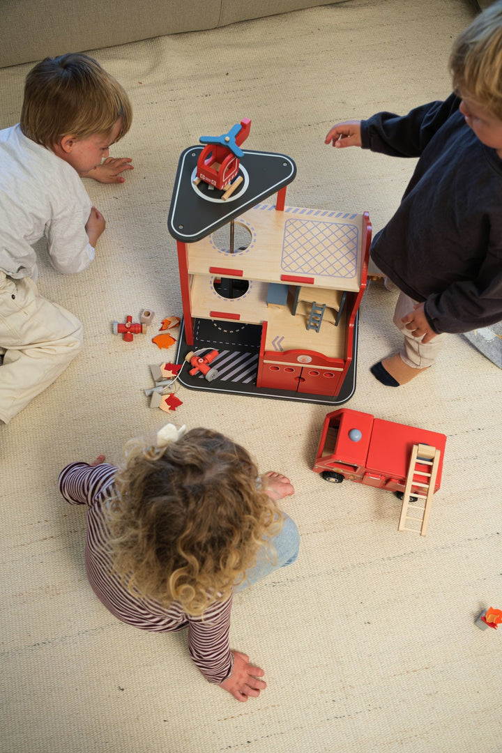 Large fire station with miniature friend