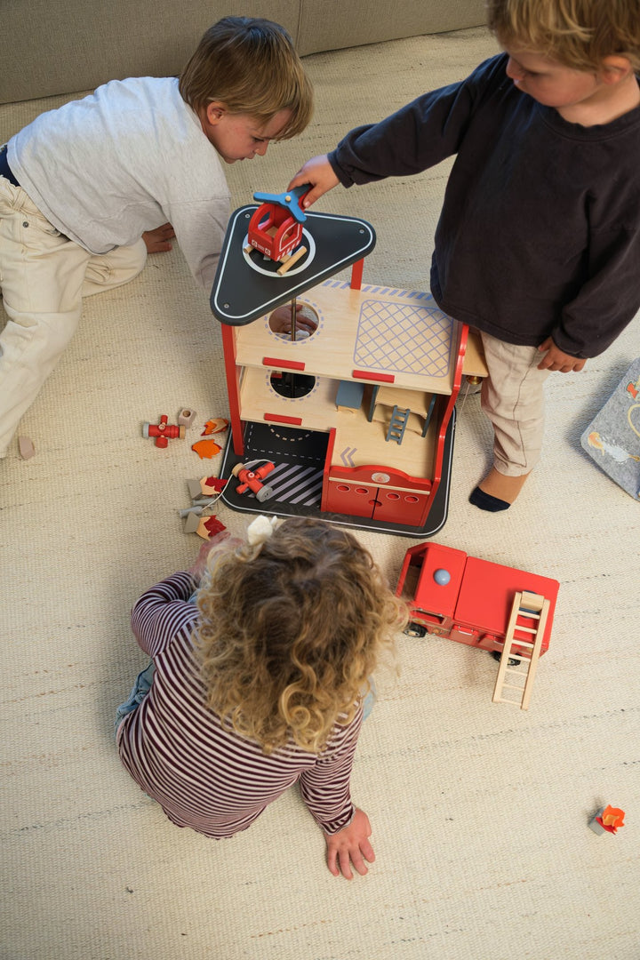 Large fire station with miniature friend