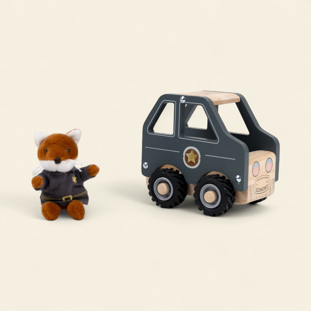 Police car with miniature friend