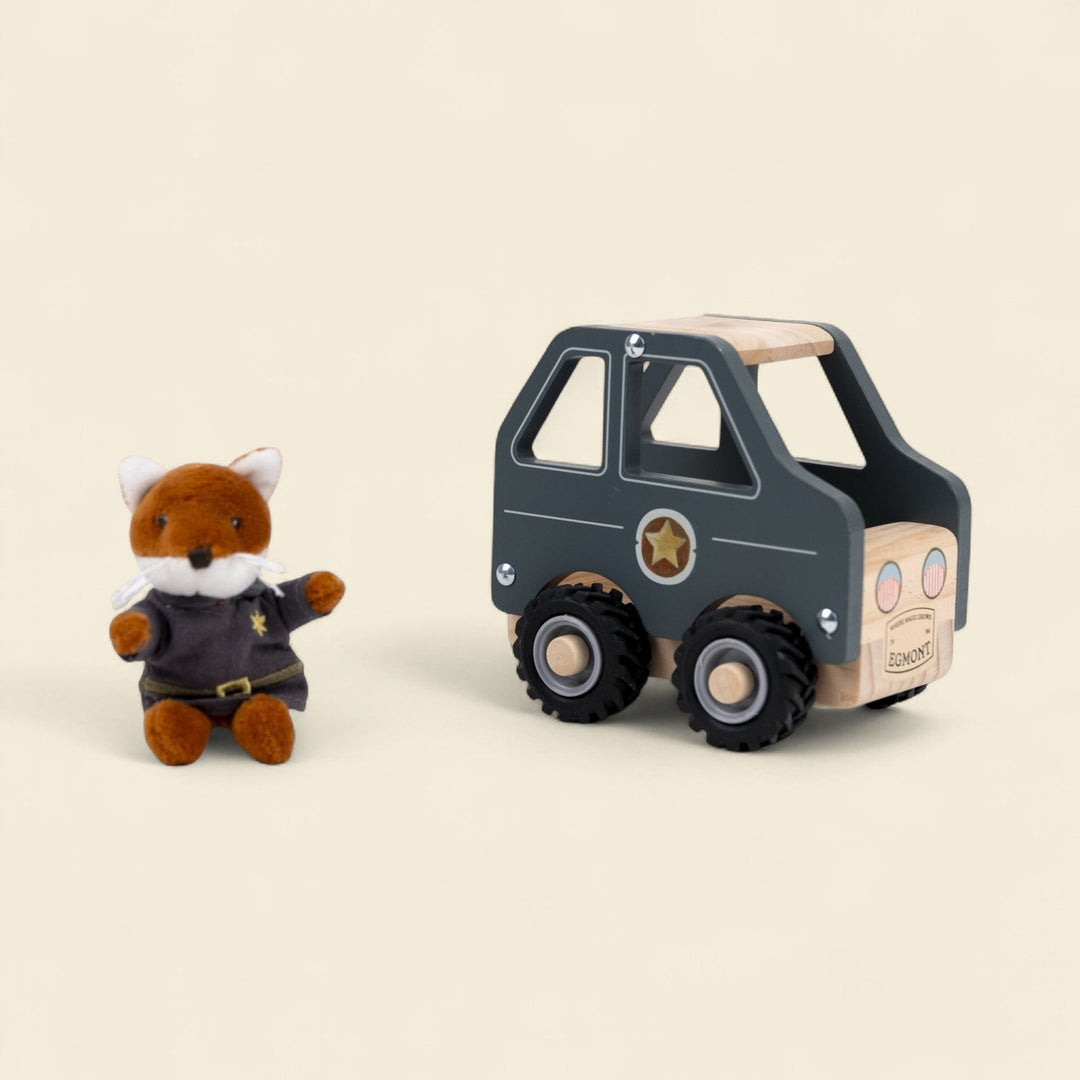 Police car with miniature friend