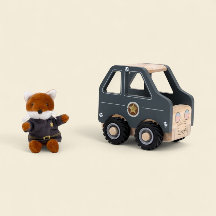 Police car with miniature friend