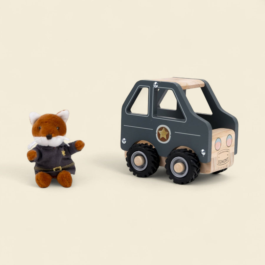 Police car with miniature friend