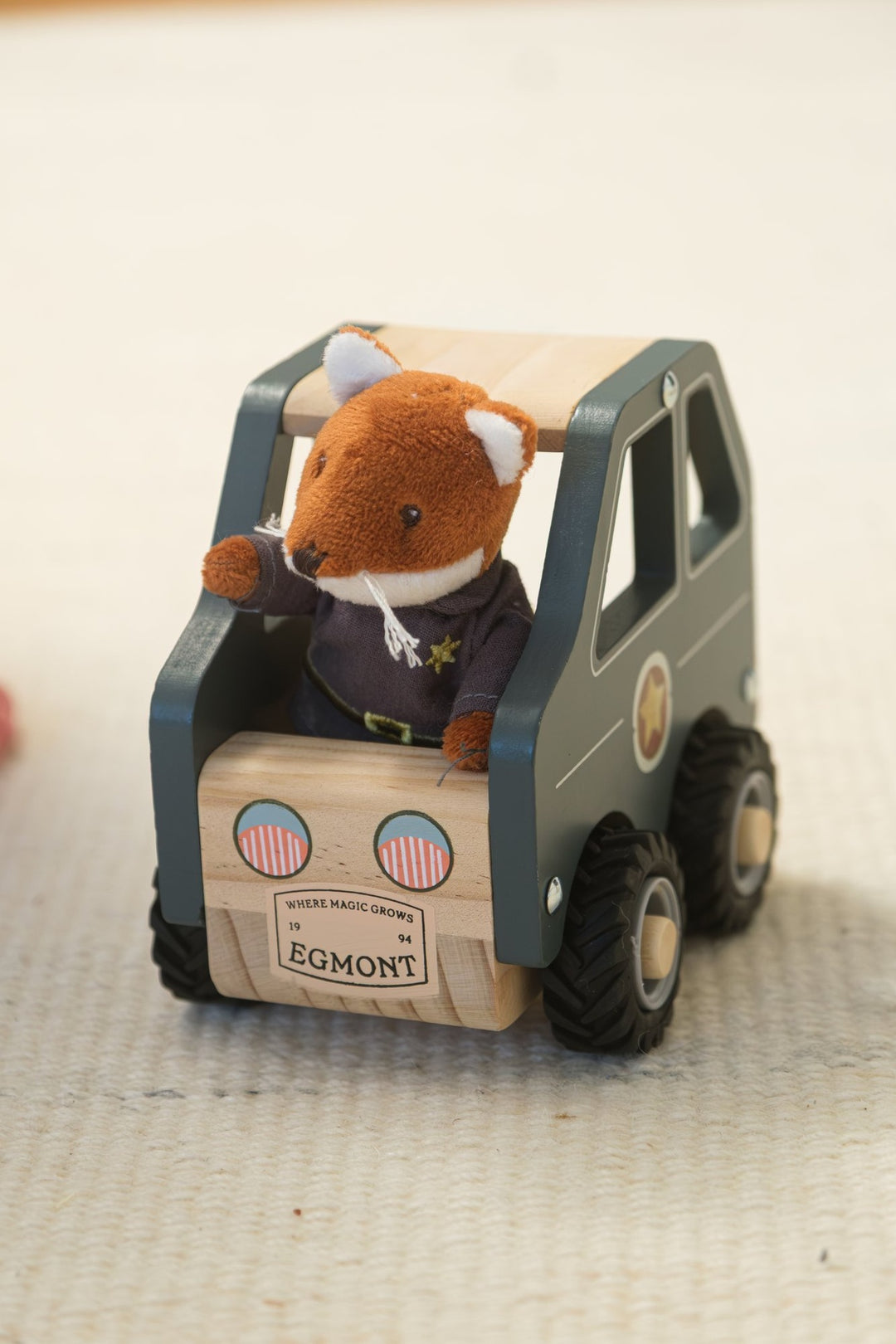 Police car with miniature friend