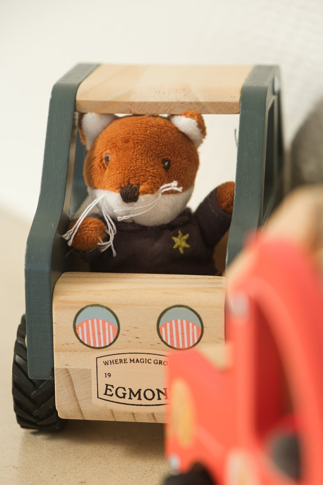Police car with miniature friend