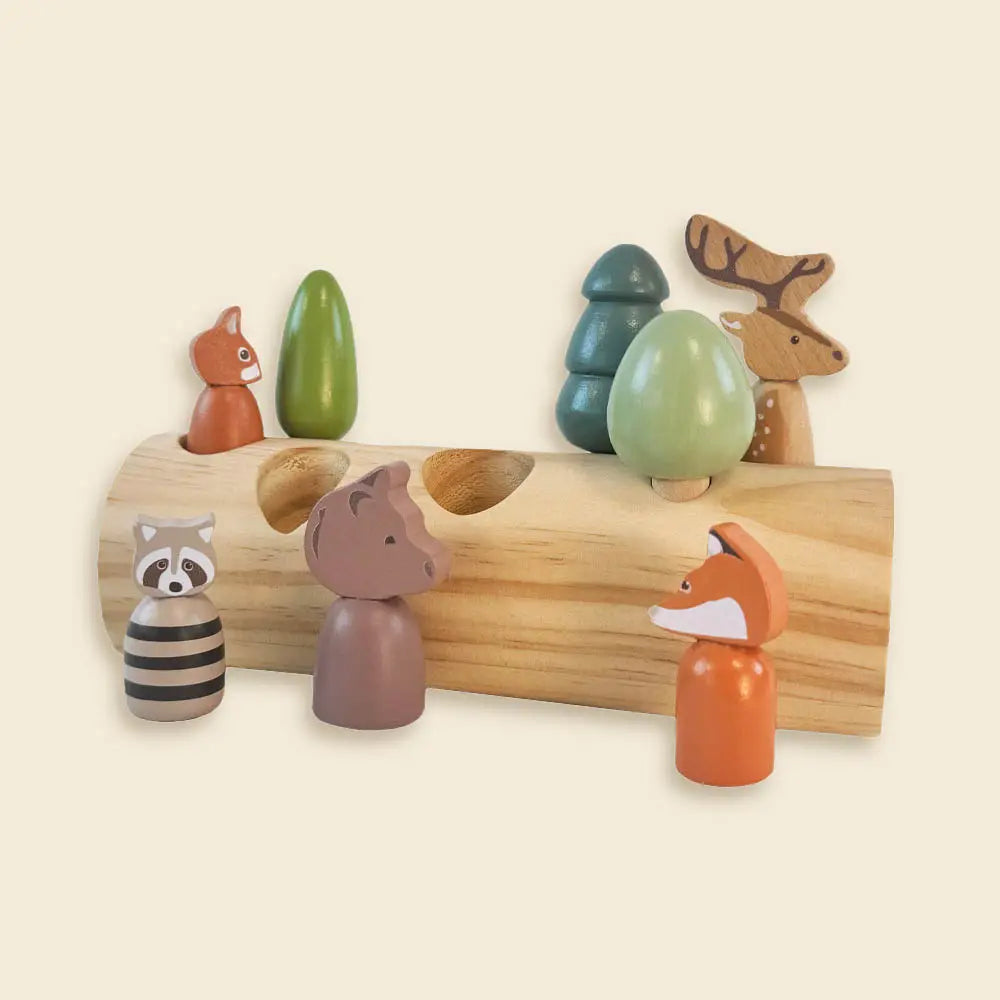 FOREST ANIMALS IN A LOG