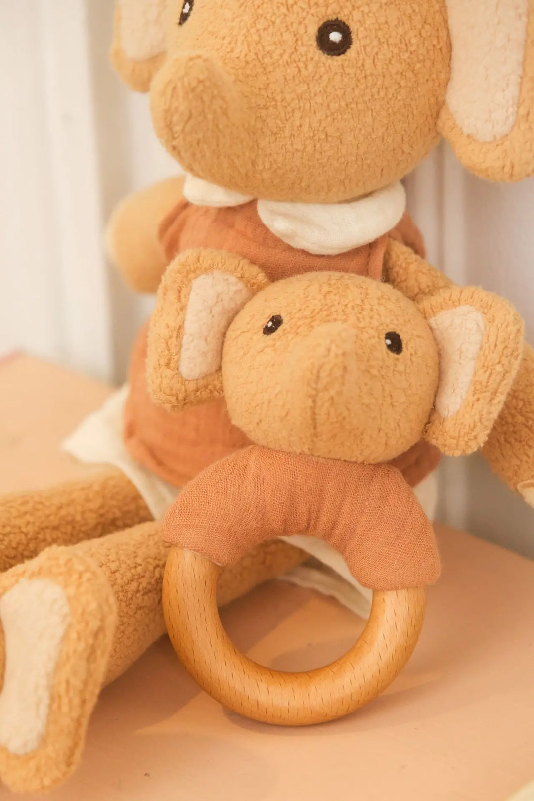 Ollie elephant doudou and rattle styled close-up