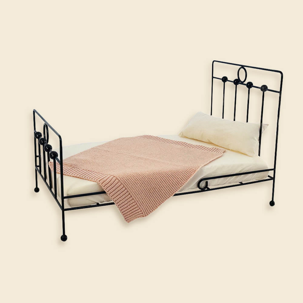 Metal doll bed with bedding