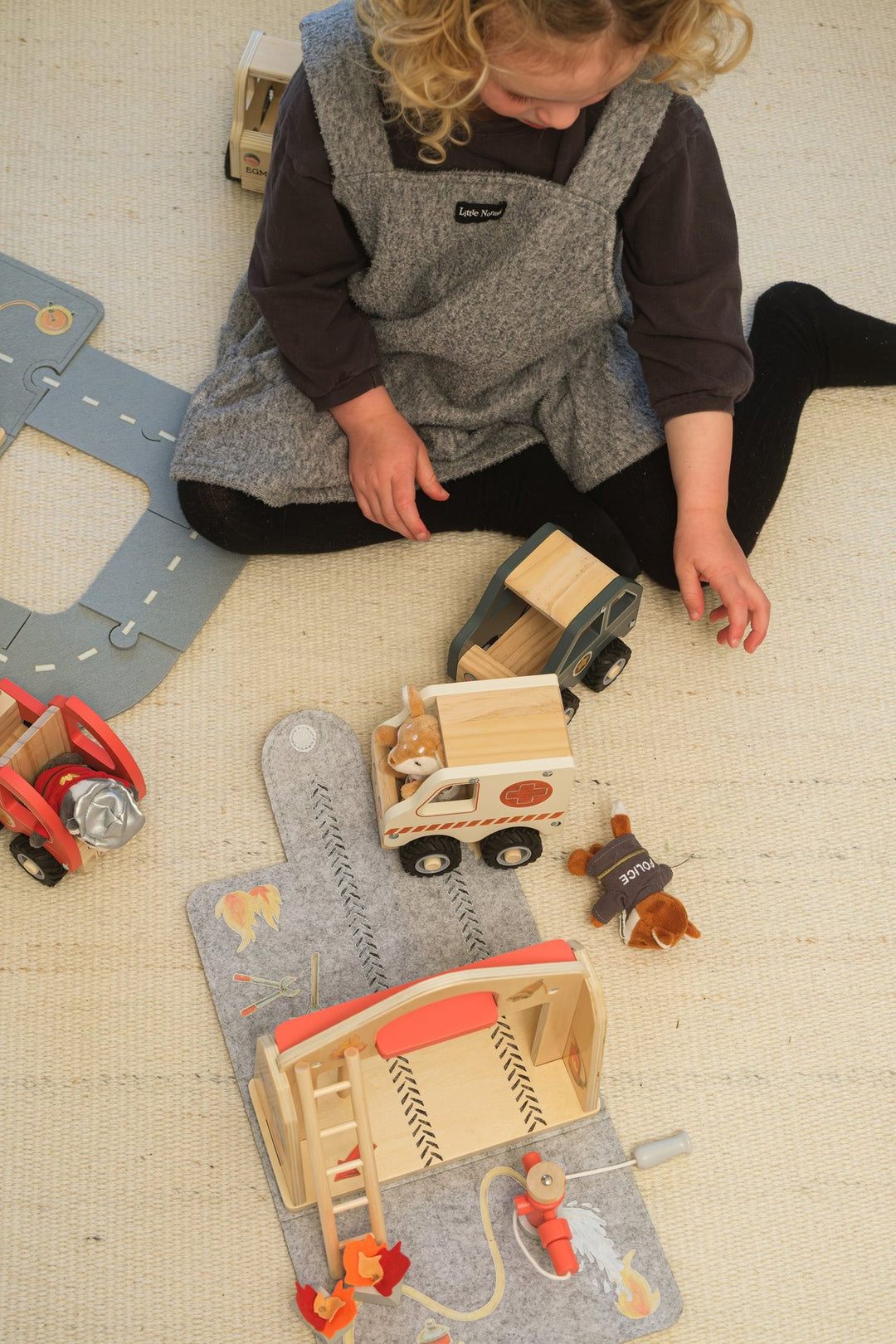 Fire station felt house with miniature friend