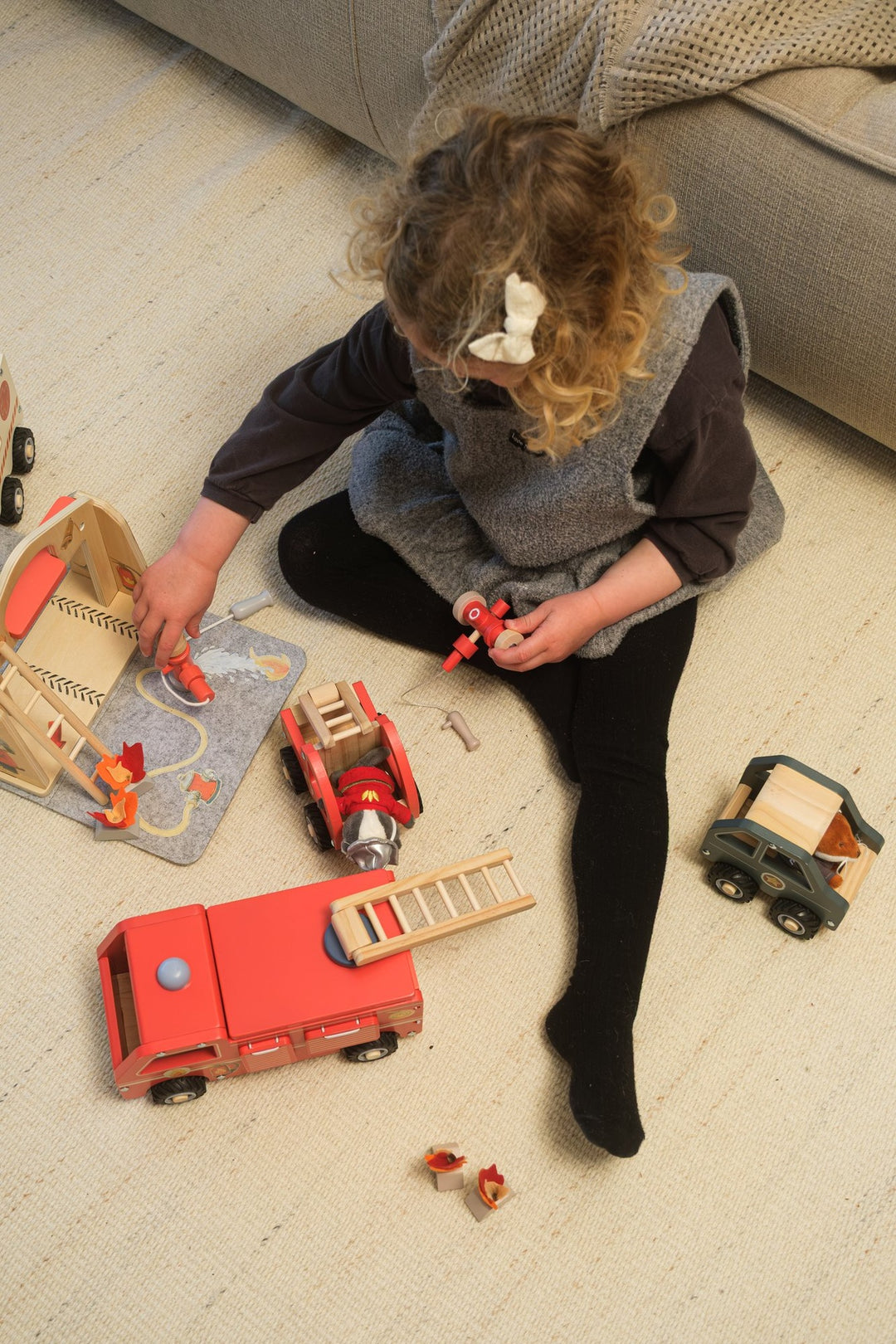 Fire station felt house with miniature friend
