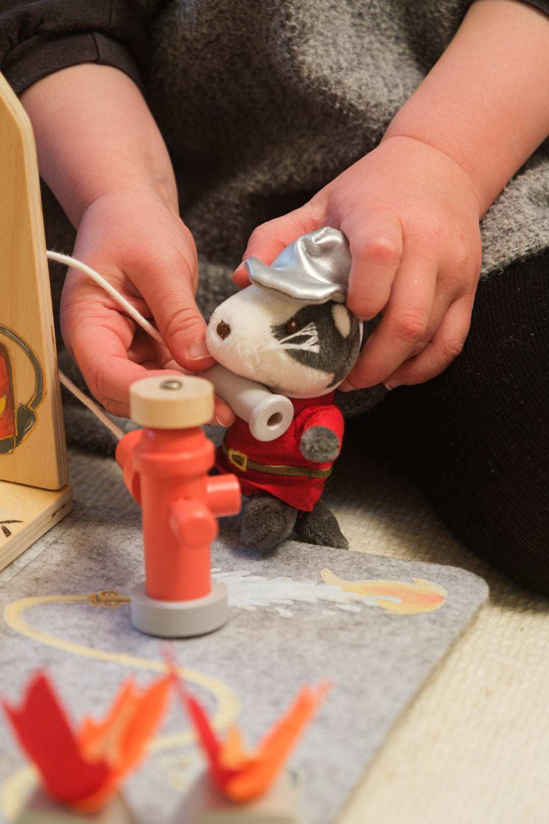 Fire station felt house with miniature friend