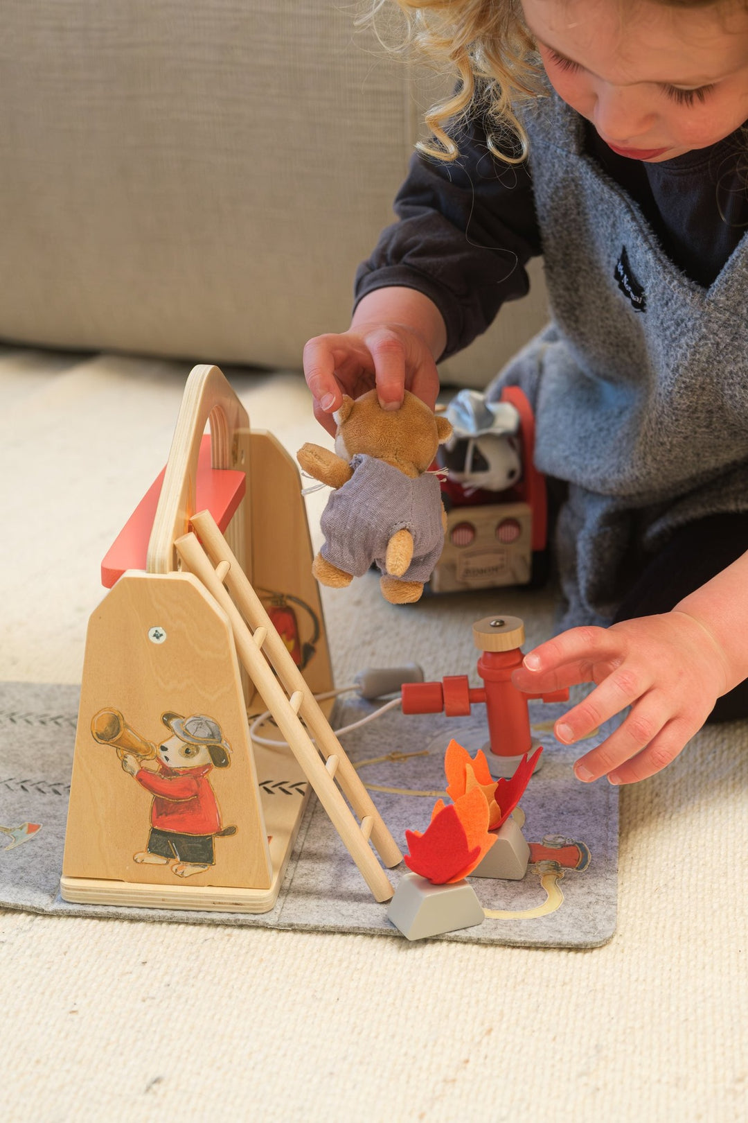 Fire station felt house with miniature friend