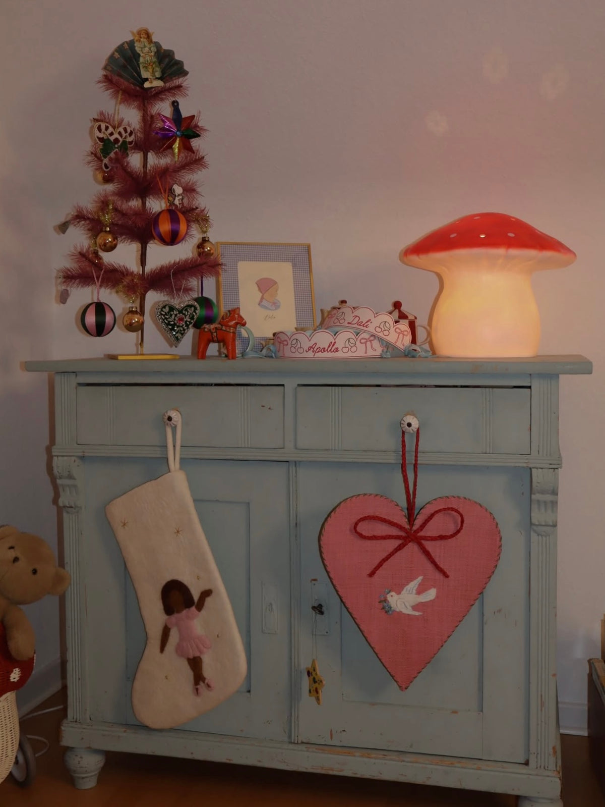 Mushroom lamp glowing on dresser